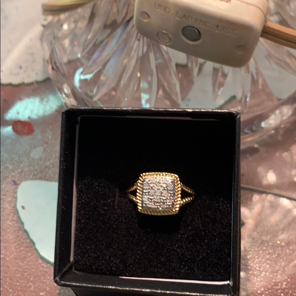 Diamond ring set in yellow and white gold size 7